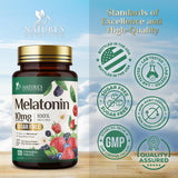 Close-up of Nature's Nutrition Melatonin 10mg tablet on a wooden surface