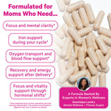 Close-up of Pink Stork Iron Supplement capsules