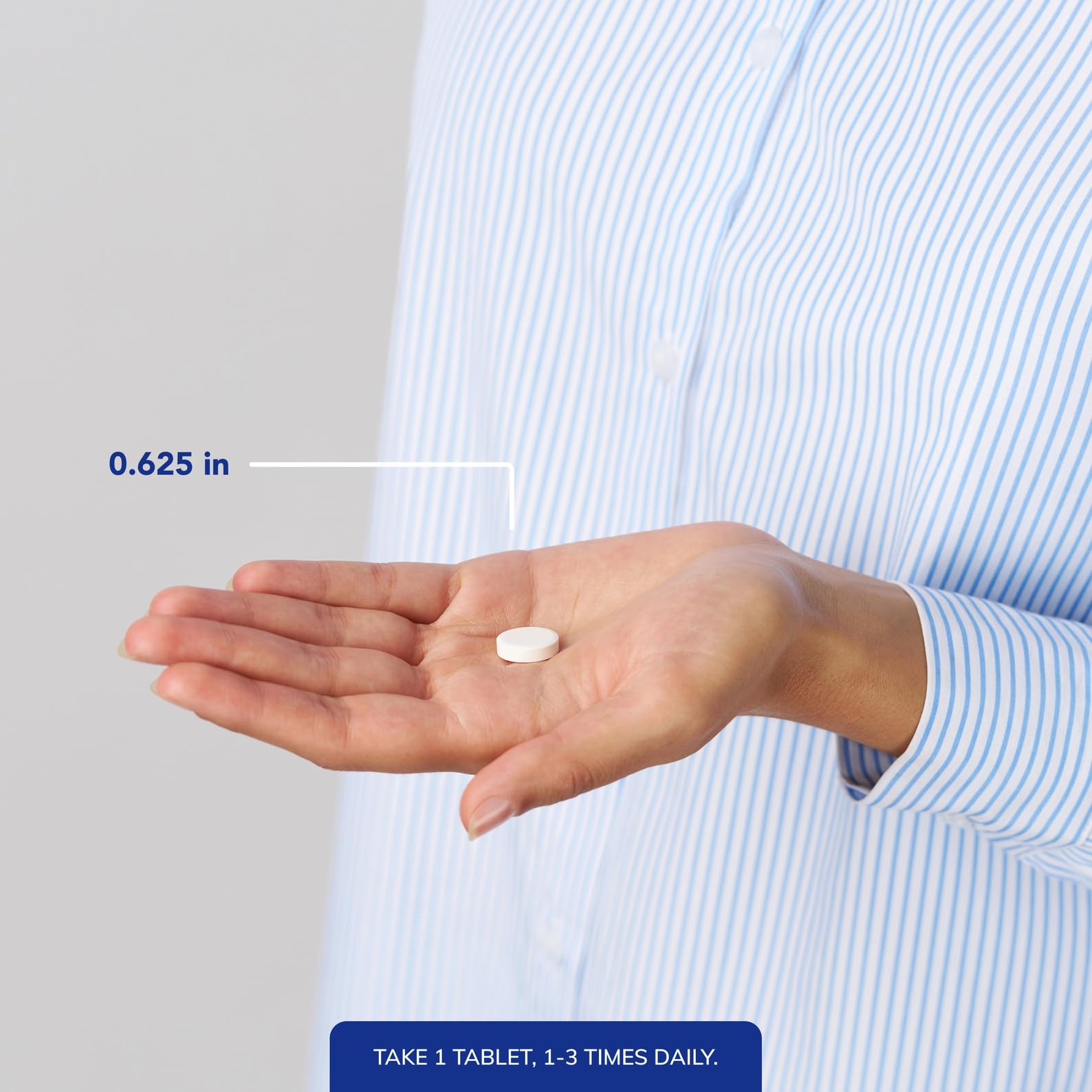 Close-up of Pure Encapsulations Zinc Chewable Tablet on a wooden surface