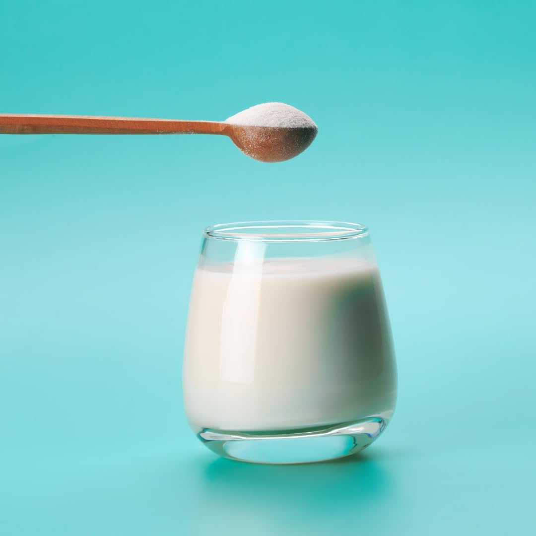 Close-up of PURE ORIGINAL INGREDIENTS Calcium Citrate Powder scoop