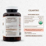 Close-up of Secrets of the Tribe Cilantro Dried Leaf Organic Capsules