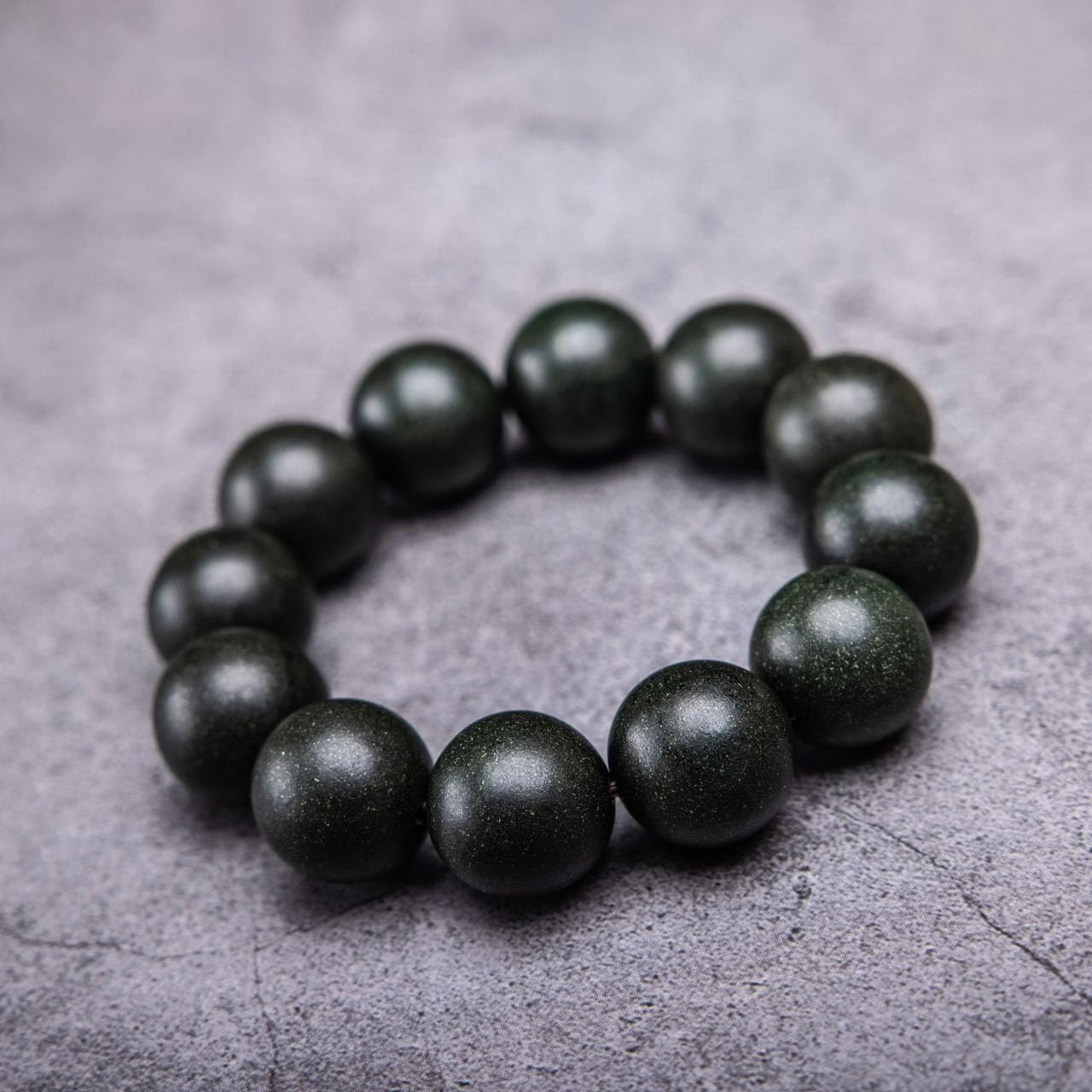 Close-up of Spirit Lavender Bracelet showcasing Agarwood and Sandalwood