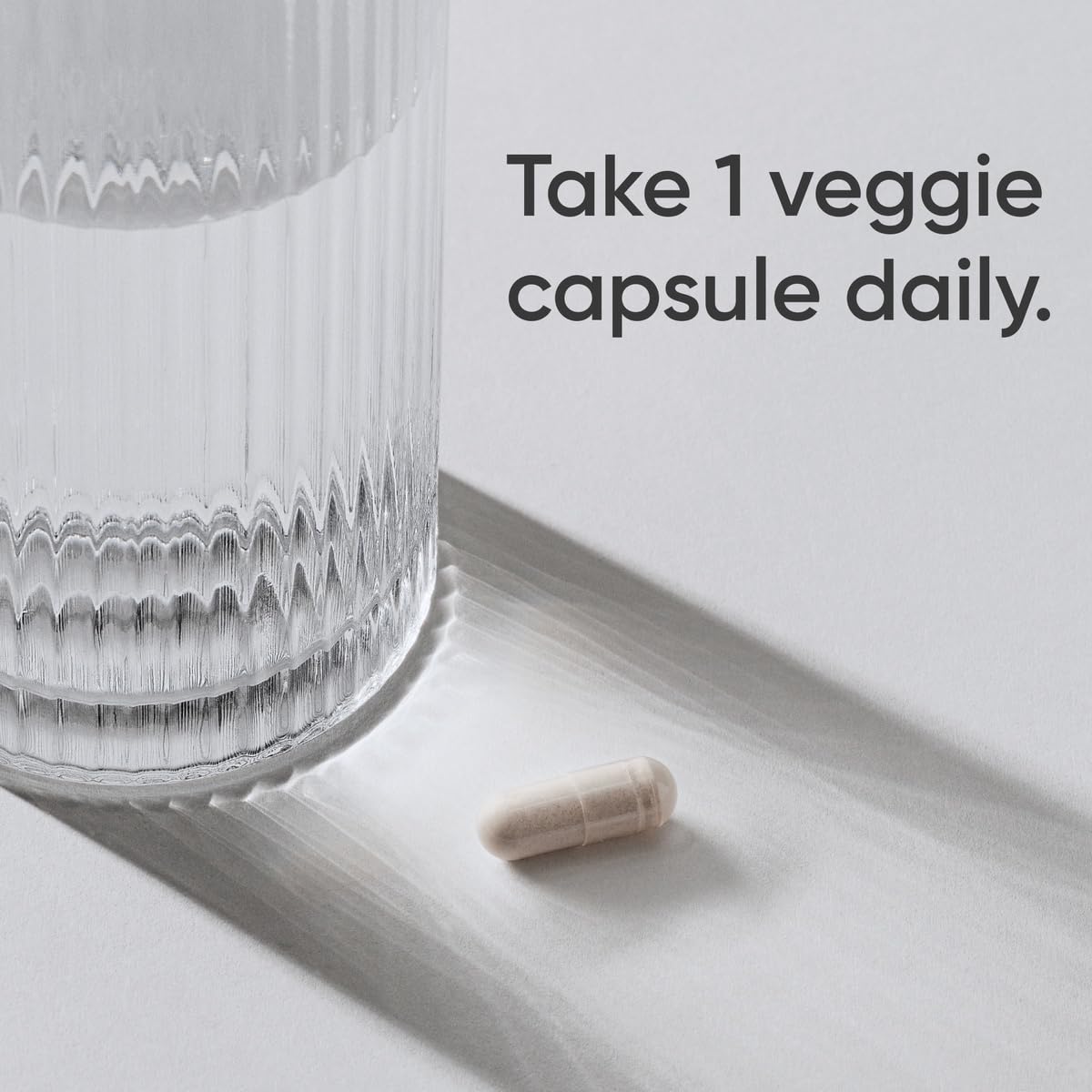 Close-up of Sports Research daily Enzymes capsule