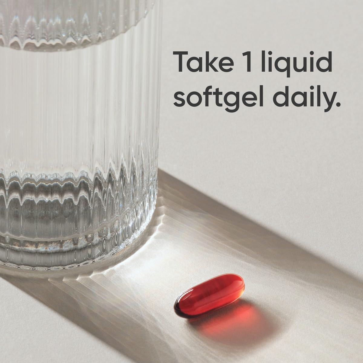 Close-up of Sports Research Omega-3 Krill Oil softgel