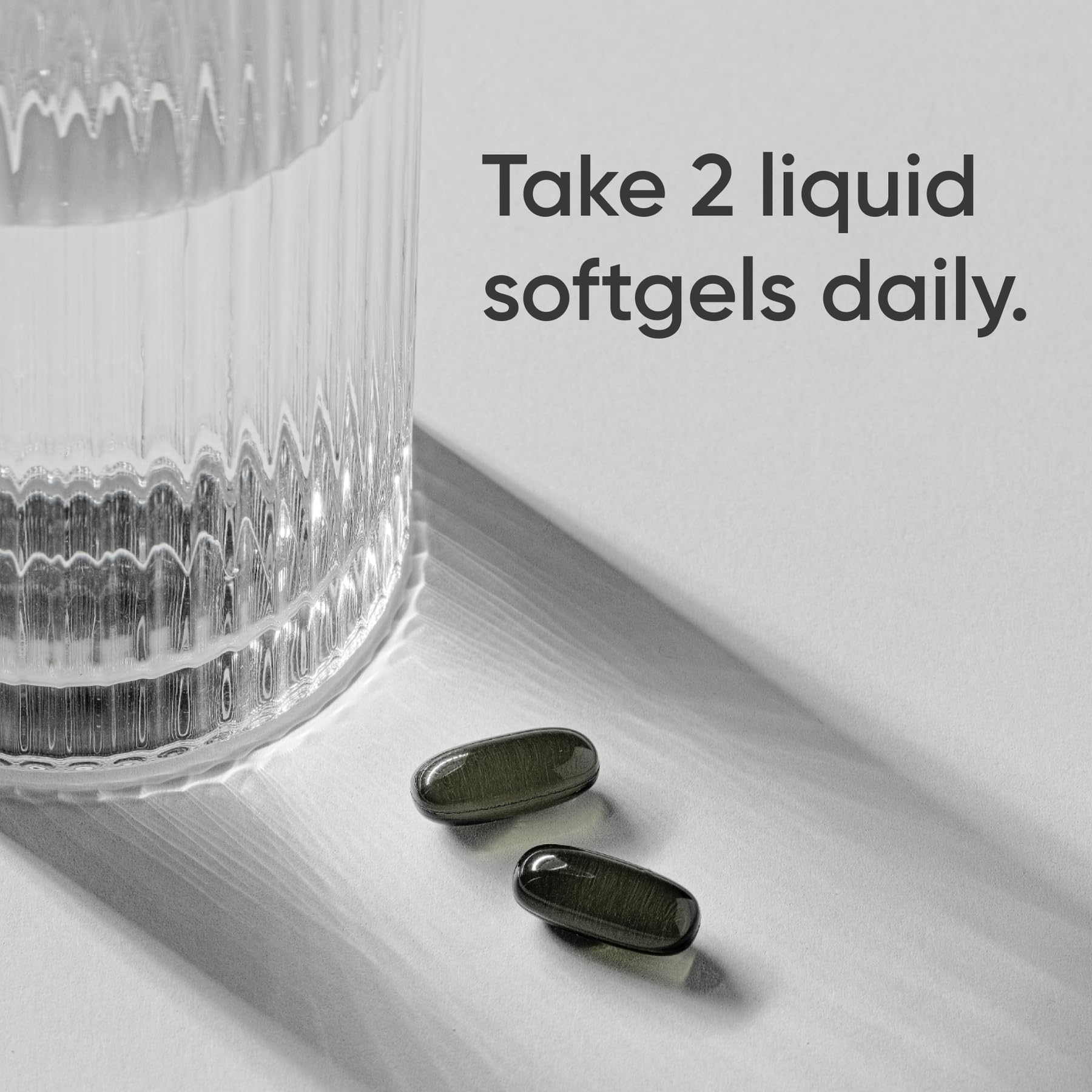 Close-up of Sports Research Oregano Oil & Black Cumin Seed Oil Softgels