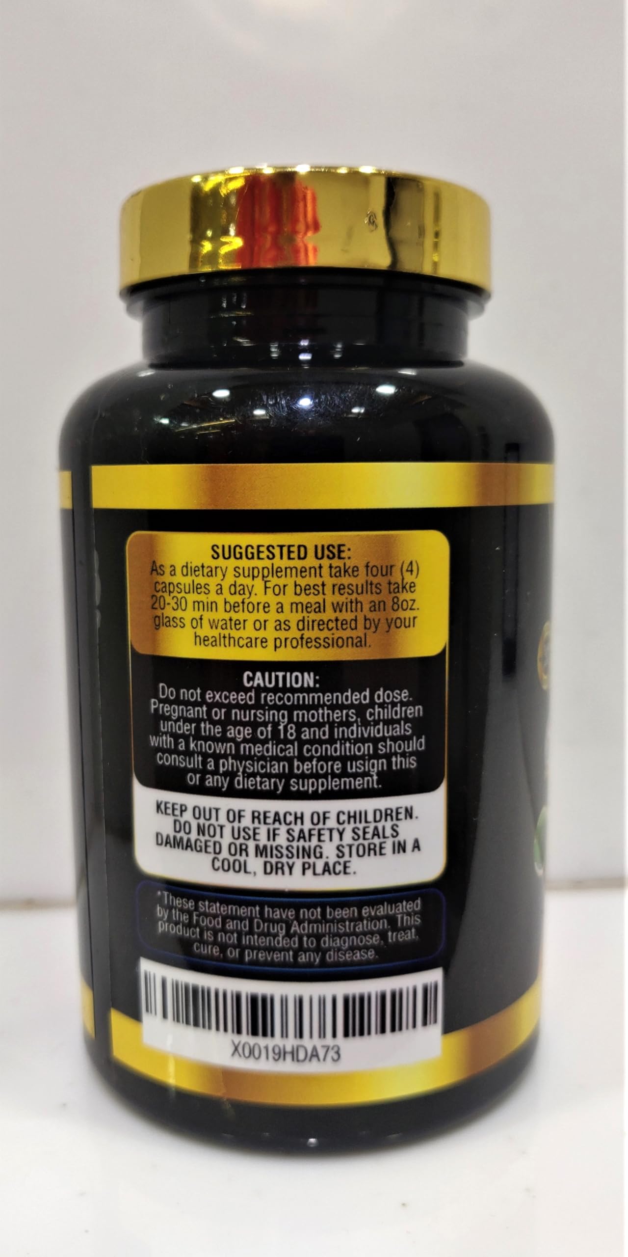 Close-up of Tenmido Royal Jelly Supplement capsules