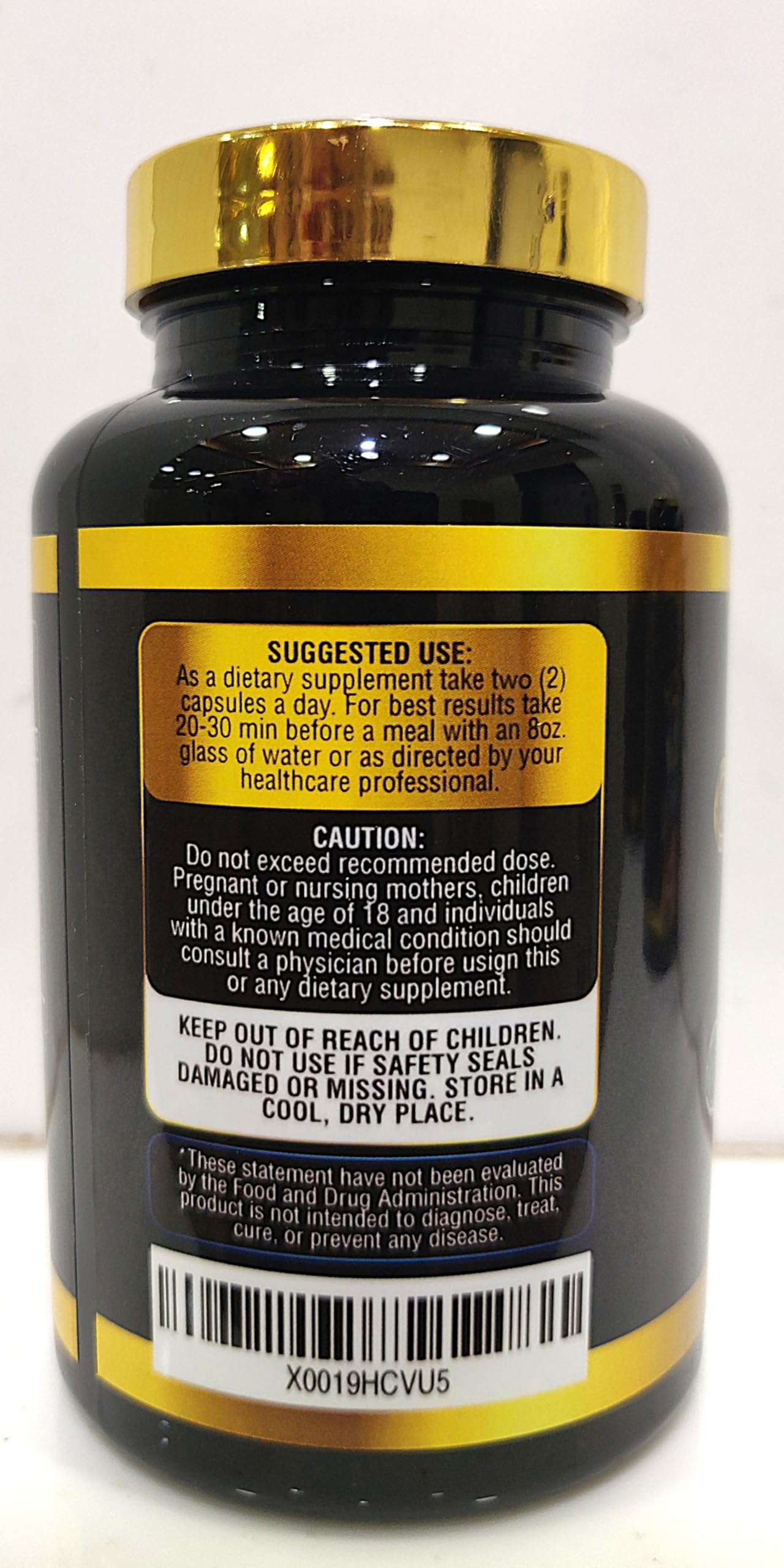 Close-up of Tenmido Wormwood Supplement capsules