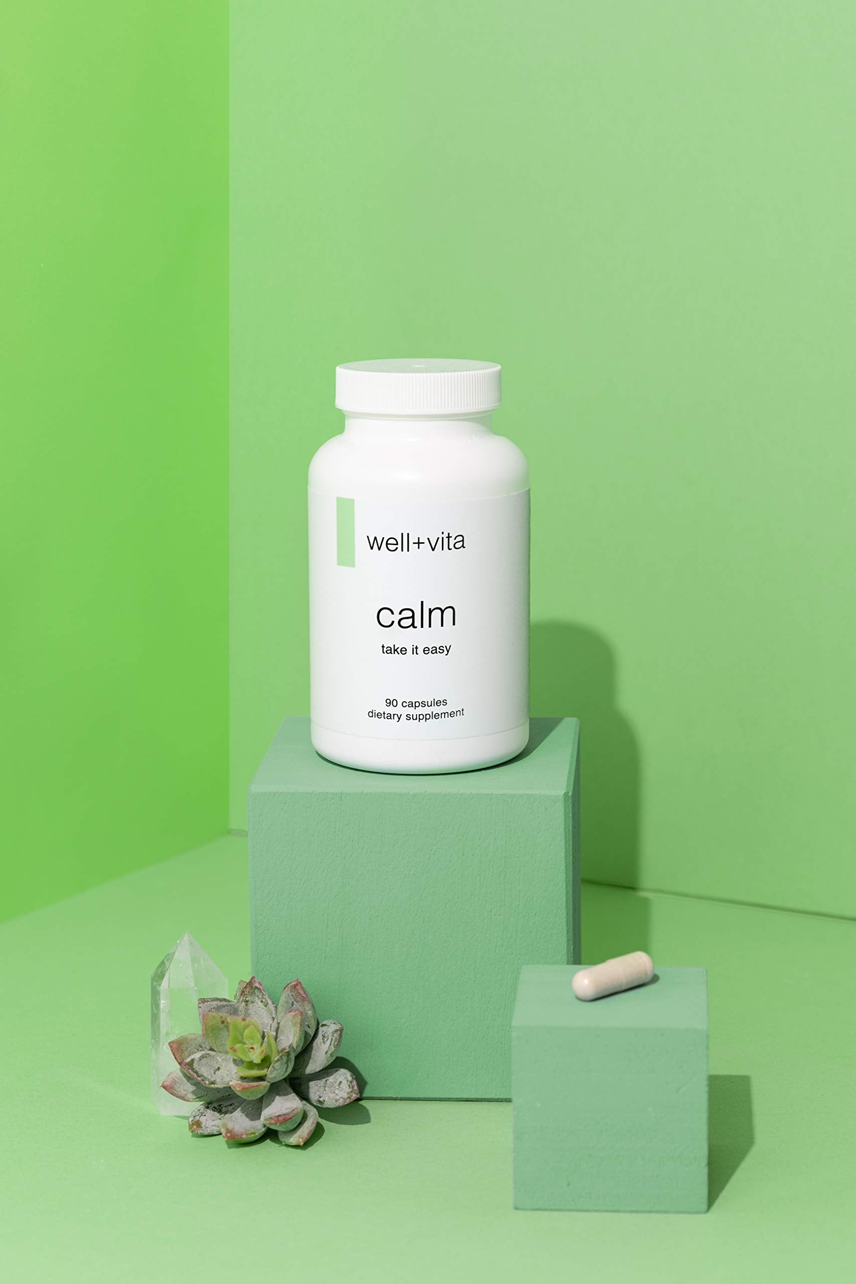 Close-up of WELL+VITA CALM capsules