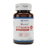 Close-up of WELLNESS EXTRACT Vitamin E softgel capsule