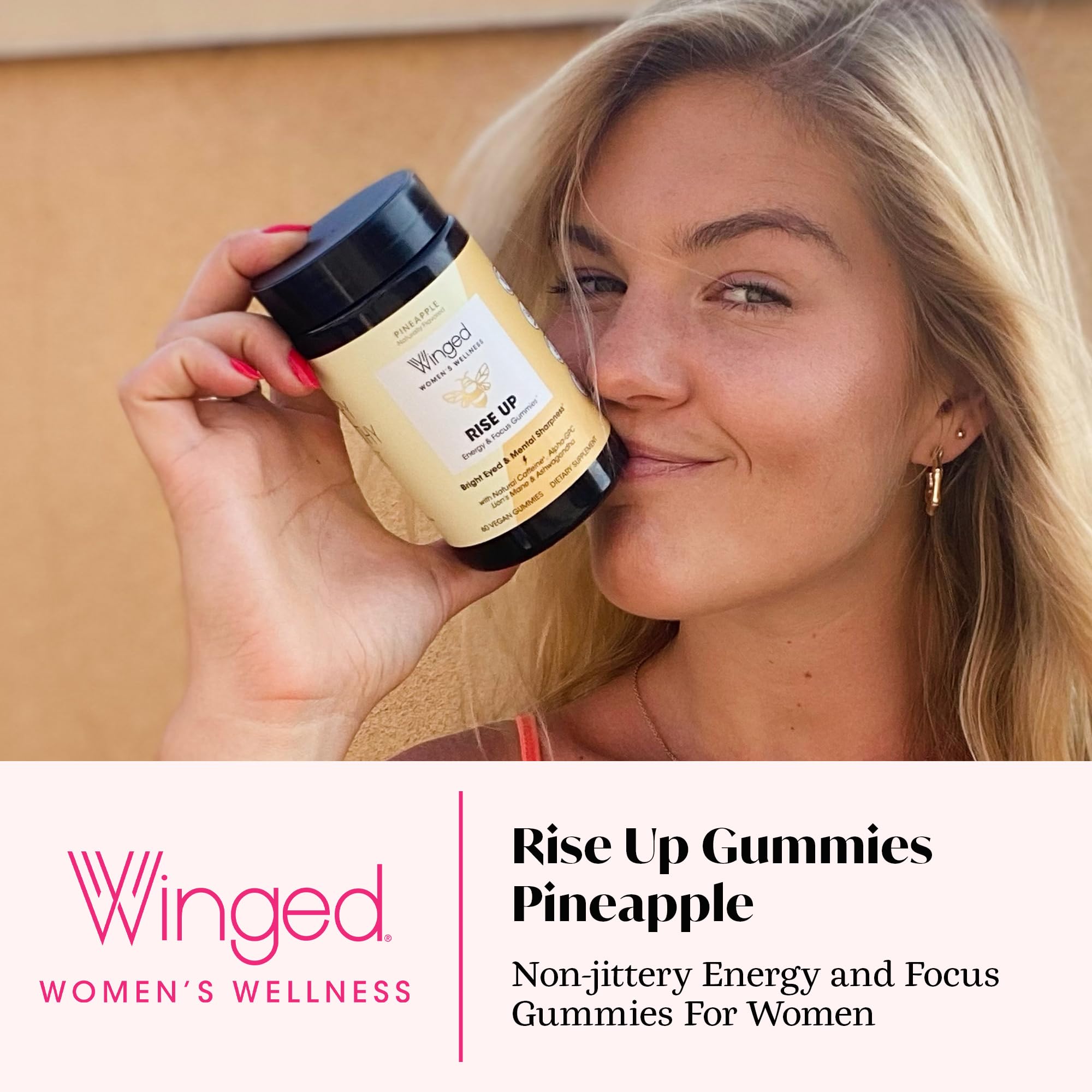 Close-up of Winged Wellness Rise Up Gummies showing gummies
