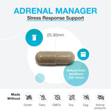 Close-up of XYMOGEN Adrenal Manager capsules in a hand