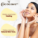 COCOCARE Vitamin E Oil 14g displayed with natural ingredients