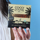 COCOGOODSCO Coconut Oil sachets arranged on a bathroom counter