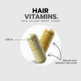 Codeage Hair Vitamins bottle and capsules on a marble background