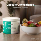 Codeage Instantfood Five A Day capsules in a hand