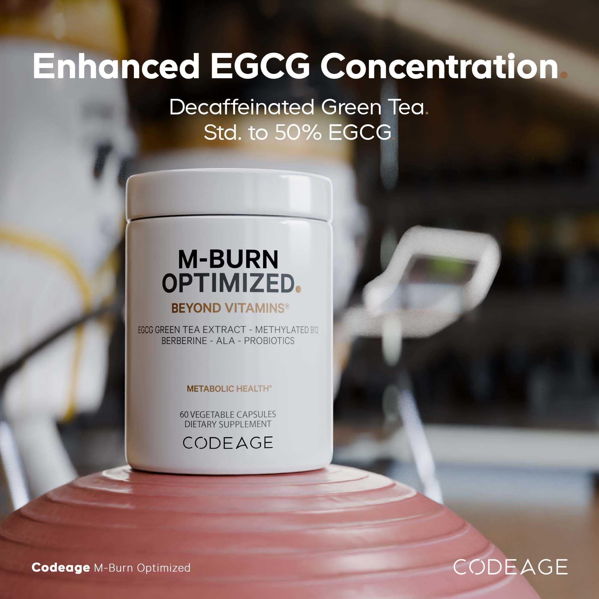 Codeage M-Burn Optimized Supplement capsules on a wooden surface