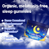 CodinAgrin Sleep Gummies with a glass of water