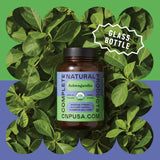 Complete Natural Products Ashwagandha Capsules 500mg capsules on a wooden surface