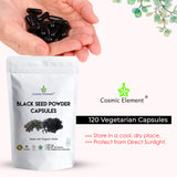 Cosmic Element Black Seed Oil Capsules in a hand for size reference