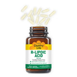 Country Life Alpha Lipoic Acid bottle on a wooden table