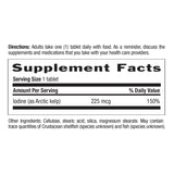 Country Life Arctic-Kelp Thyroid Extract tablet on a wooden surface