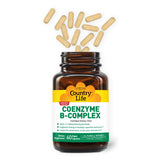 Country Life B-Complex Daily Capsules in hand