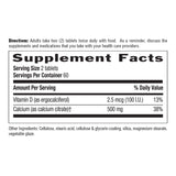 Country Life Calcium Citrate + Vitamin D capsules with a glass of water