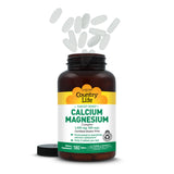 Country Life Calcium Magnesium Supplement with a measuring spoon