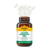 Country Life Calcium Magnesium Zinc Supplement with a measuring spoon
