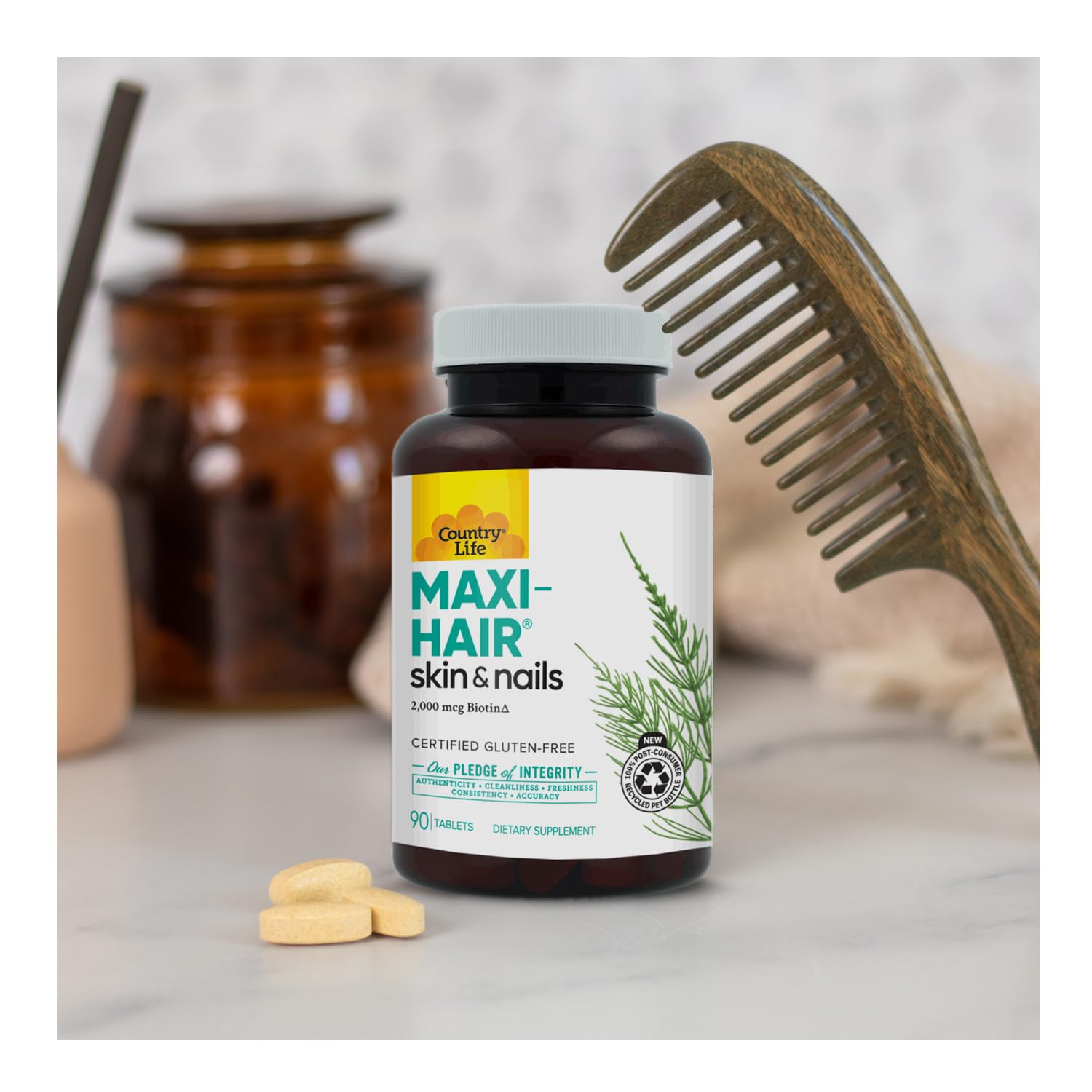 Country Life Maxi-Hair Biotin Supplement displayed with other vitamins