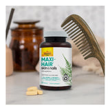 Country Life Maxi-Hair Biotin Supplement displayed with other vitamins