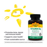 Country Life Vitamin D3 5000 IU capsules on a wooden table