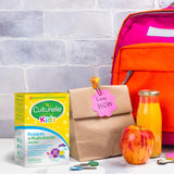 Culturelle Kids Probiotic + Complete Multivitamin Chewables in a child's hand