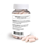 D-Mannose & Cranberry bottle with capsules spilled