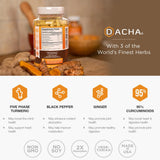 DACHA Turmeric Supplement capsules on a wooden surface