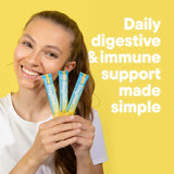 Daily Nouri Probiotic Powder Stick Pack with water