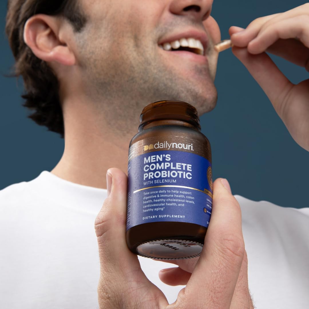Daily Nouri Probiotic Supplement for Men with a measuring spoon