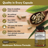 DailyNutra Mushroom Blend Supplement on a wooden table with a glass of water