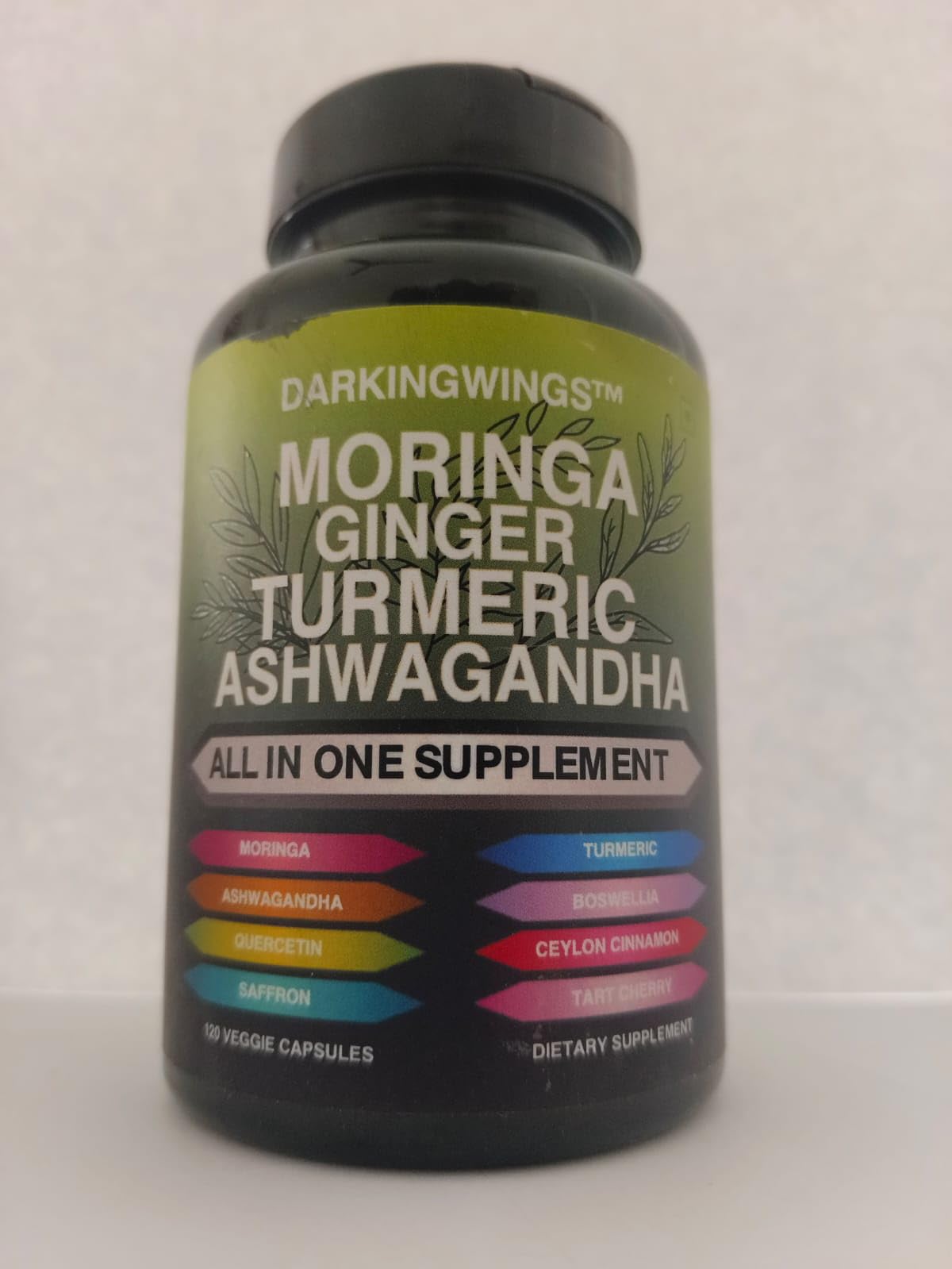 Darkingwings Turmeric Curcumin Capsules with herbal background