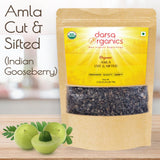 Darsa Organics Amla Berry Dried Fruit on a wooden table