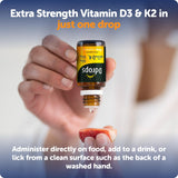 Ddrops Vitamin D3 + K2 Liquid Drops 5000 IU on a spoon