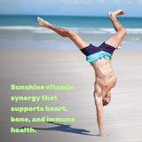 DEAL SUPPLEMENT Vitamin D3 & K2 softgel on a wooden table