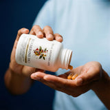 Dear Apothecary Complete Berberine Complex capsules on a wooden table