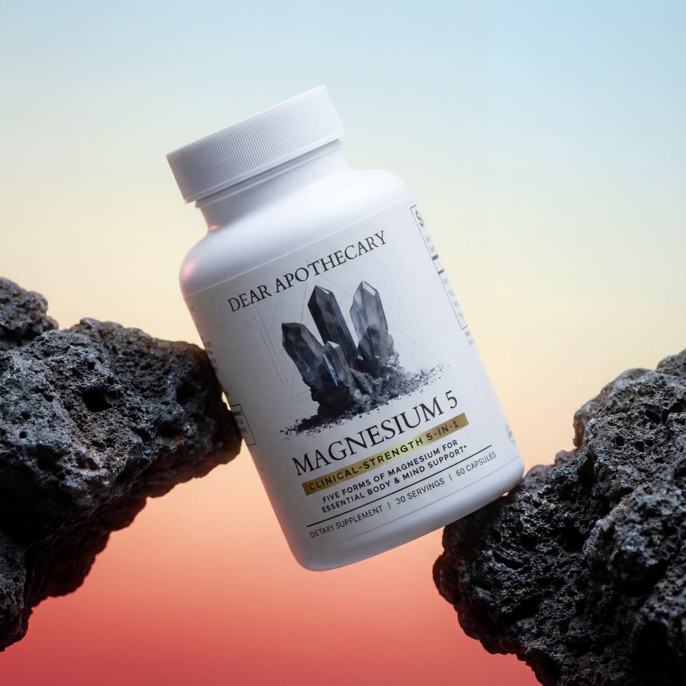 Dear Apothecary Magnesium Complex 500mg capsules on a wooden table