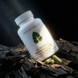Dear Apothecary Moringa Leaf Capsules on a wooden surface