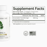 Dear Apothecary Moringa Leaf Capsules open bottle with capsules