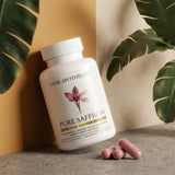 Dear Apothecary Saffron Extract capsules on a wooden surface