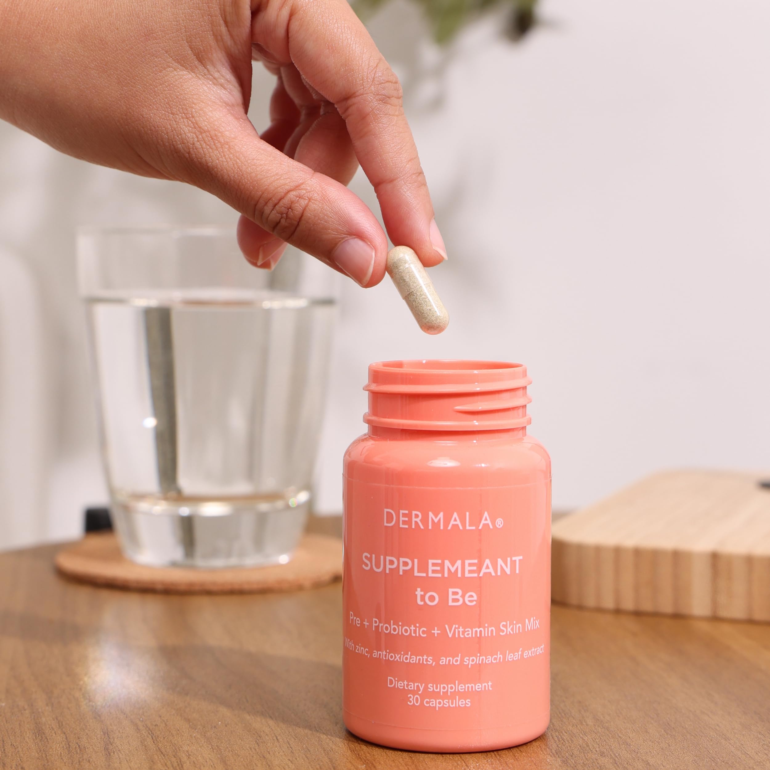 Dermala Multivitamins with Probiotics capsule in hand