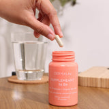 Dermala Multivitamins with Probiotics capsule in hand