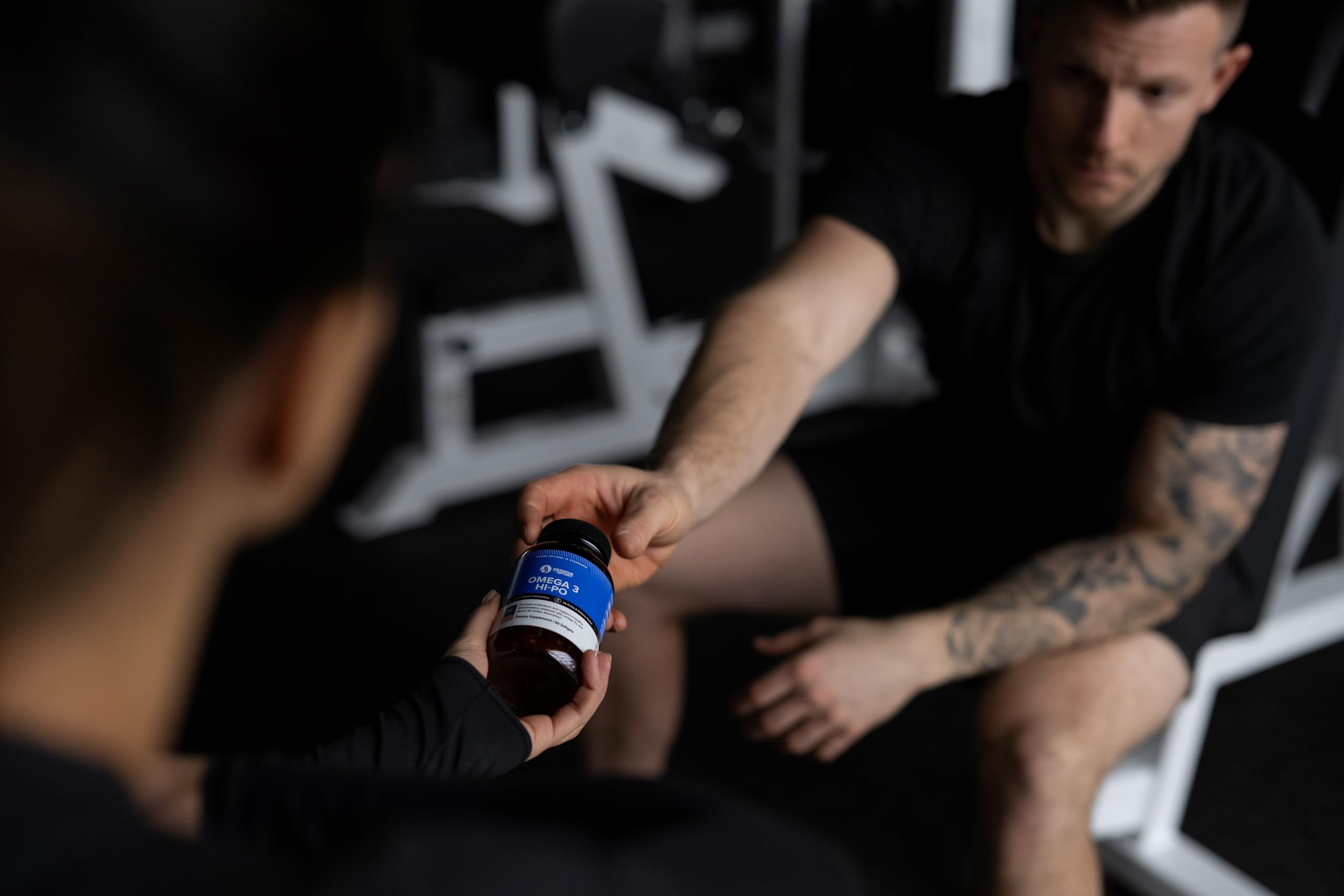 Designs for Sport Omega 3 HI-PO supplement bottle with label